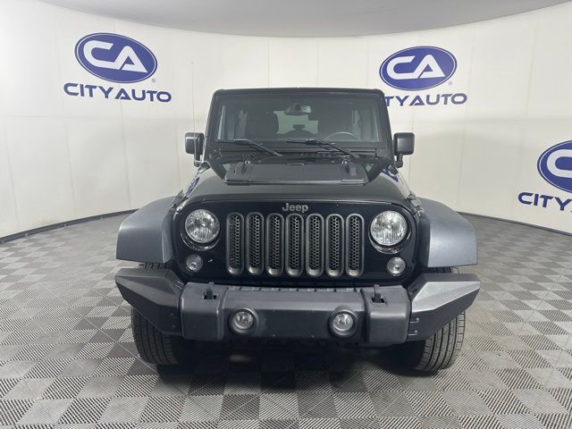 Used 2015 Jeep Wrangler Unlimited Sport with VIN 1C4BJWDG3FL518501 for sale in Memphis, TN