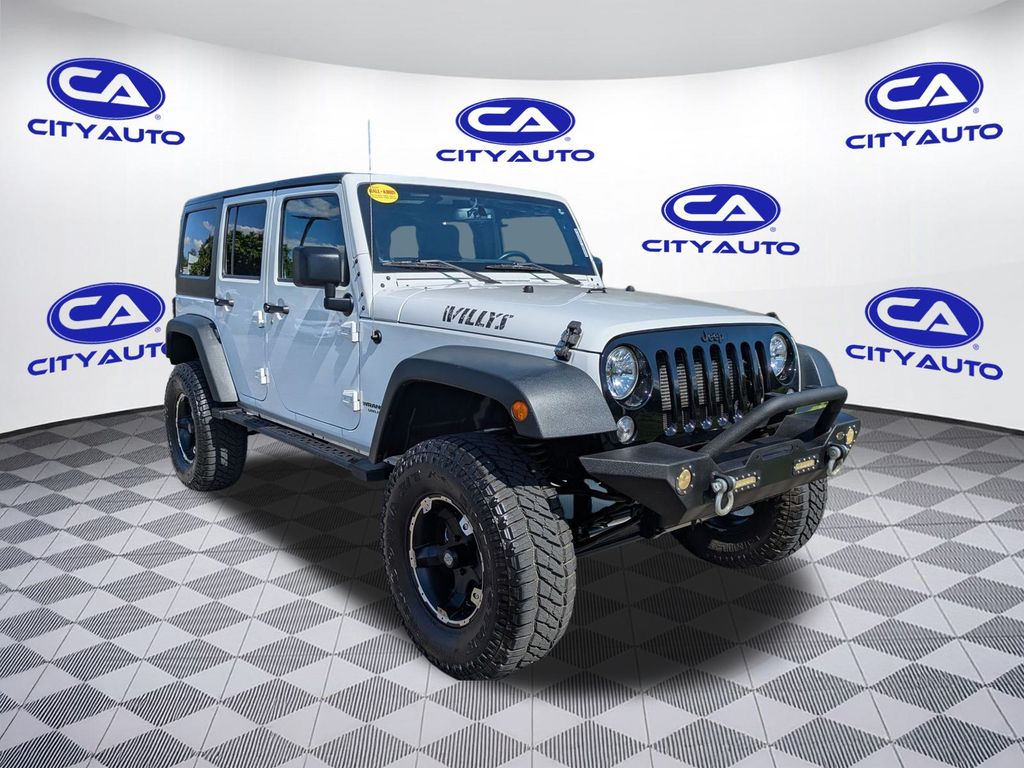 Certified 2016 Jeep Wrangler Unlimited Willys Wheeler with VIN 1C4BJWDG7GL224519 for sale in Murfreesboro, TN