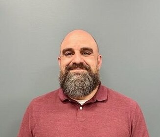 Staff member Michael Rossi from ID_10a926