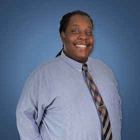 Staff member Aaron Sanders from f5f38a03c1d2