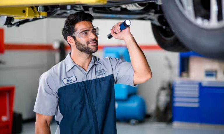 Clark Hyundai service technician performing a winter inspection in Kalispell, MT