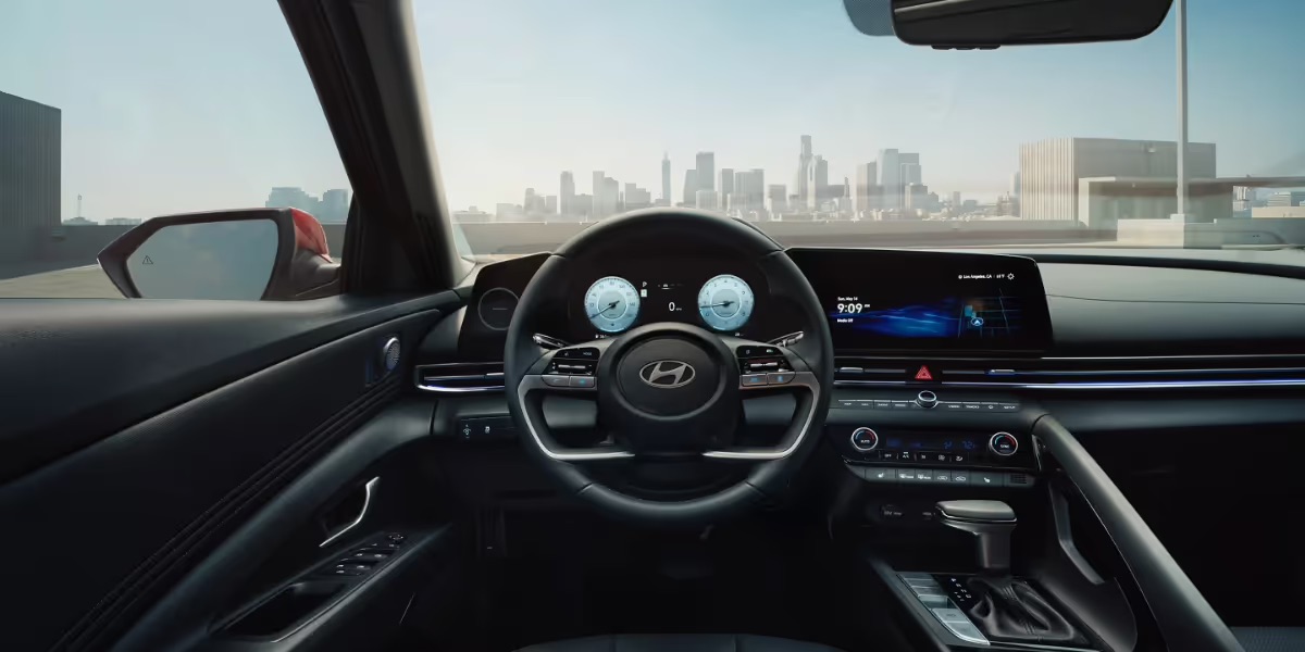 2026 Hyundai Elantra interior dashboard showing digital screens, steering wheel, and console layout