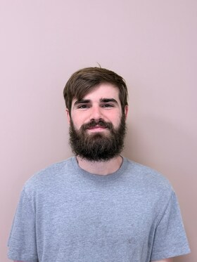 Staff member Carter Larson from c7e89c4834c3