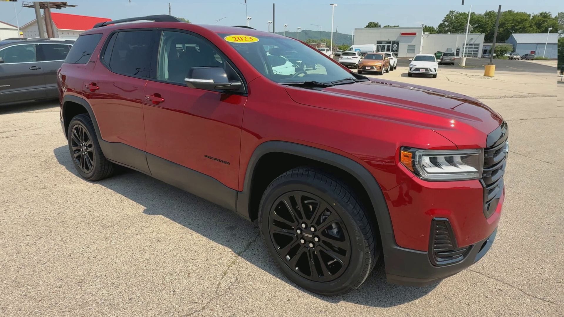 Used 2023 GMC Acadia SLE with VIN 1GKKNRL41PZ143434 for sale in La Crosse, WI