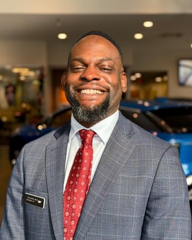 Staff member Charles King III from ID_ad769b