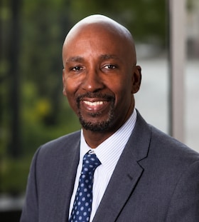 Staff member GARTH COOPER from ID_ad769b