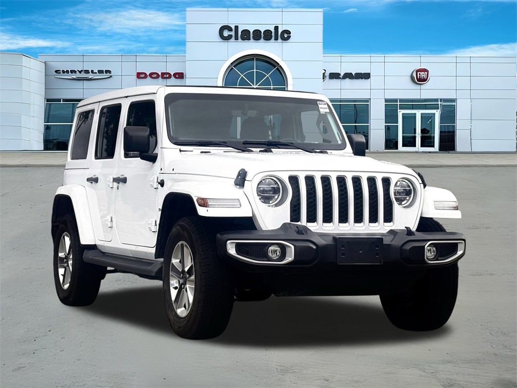 Used 2021 Jeep Wrangler Unlimited Sahara 4XE with VIN 1C4JJXP60MW677041 for sale in Arlington, TX