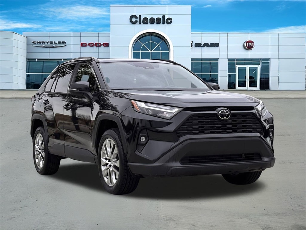 Used 2022 Toyota RAV4 XLE Premium with VIN JTMC1RFV4ND085829 for sale in Arlington, TX