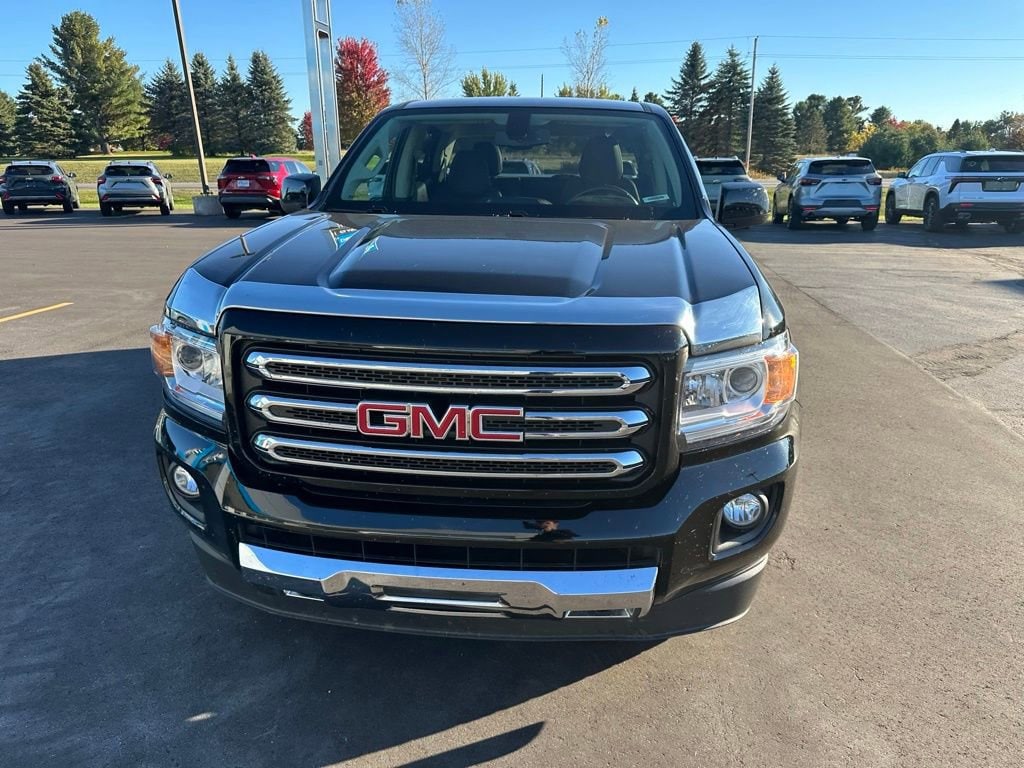 Used 2015 GMC Canyon SLE with VIN 1GTG6BE34F1236889 for sale in Lake City, MI
