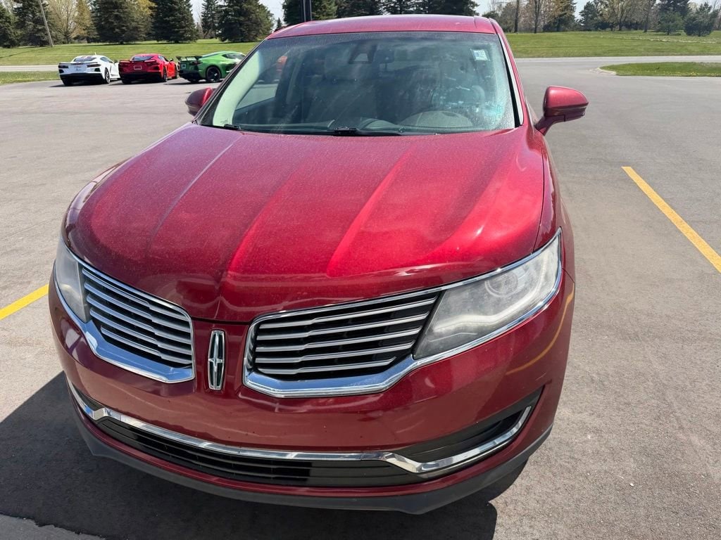 Used 2016 Lincoln MKX Select with VIN 2LMTJ8KR4GBL71594 for sale in Lake City, MI
