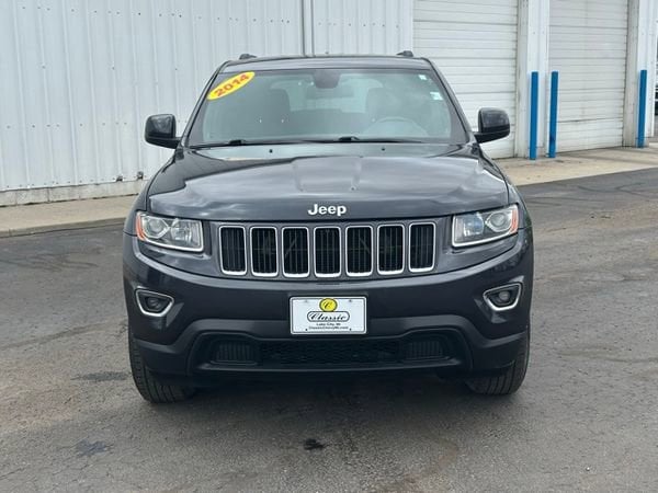 Used 2014 Jeep Grand Cherokee Laredo with VIN 1C4RJFAG4EC383949 for sale in Lake City, MI