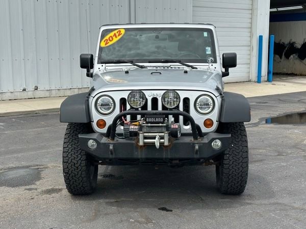 Used 2012 Jeep Wrangler Sport with VIN 1C4AJWAG6CL181754 for sale in Lake City, MI