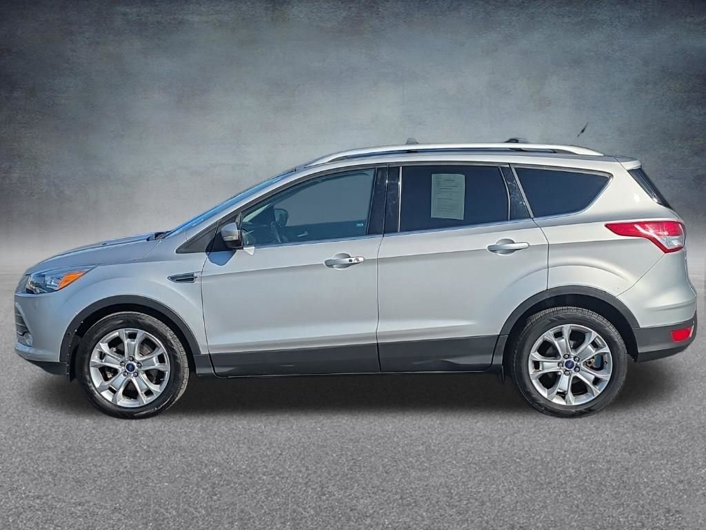 Used 2016 Ford Escape Titanium with VIN 1FMCU9J95GUC25399 for sale in Lake City, MI