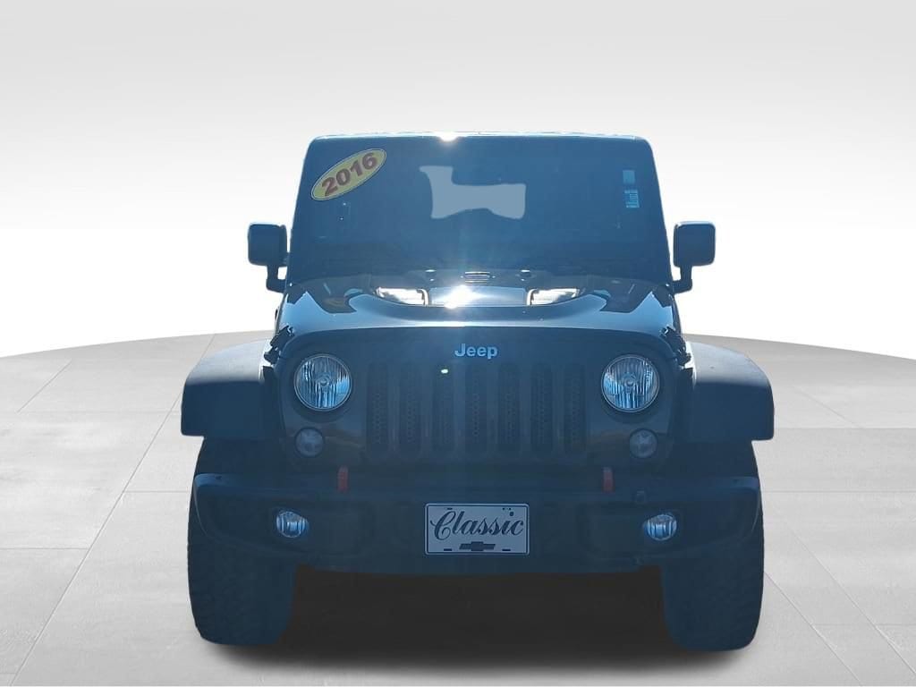 Used 2016 Jeep Wrangler Unlimited Rubicon Hard Rock with VIN 1C4HJWFGXGL209505 for sale in Lake City, MI