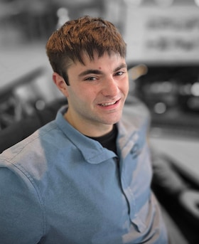 Staff member DAWSON CORRIGAN from ID_f34da1d9ec08