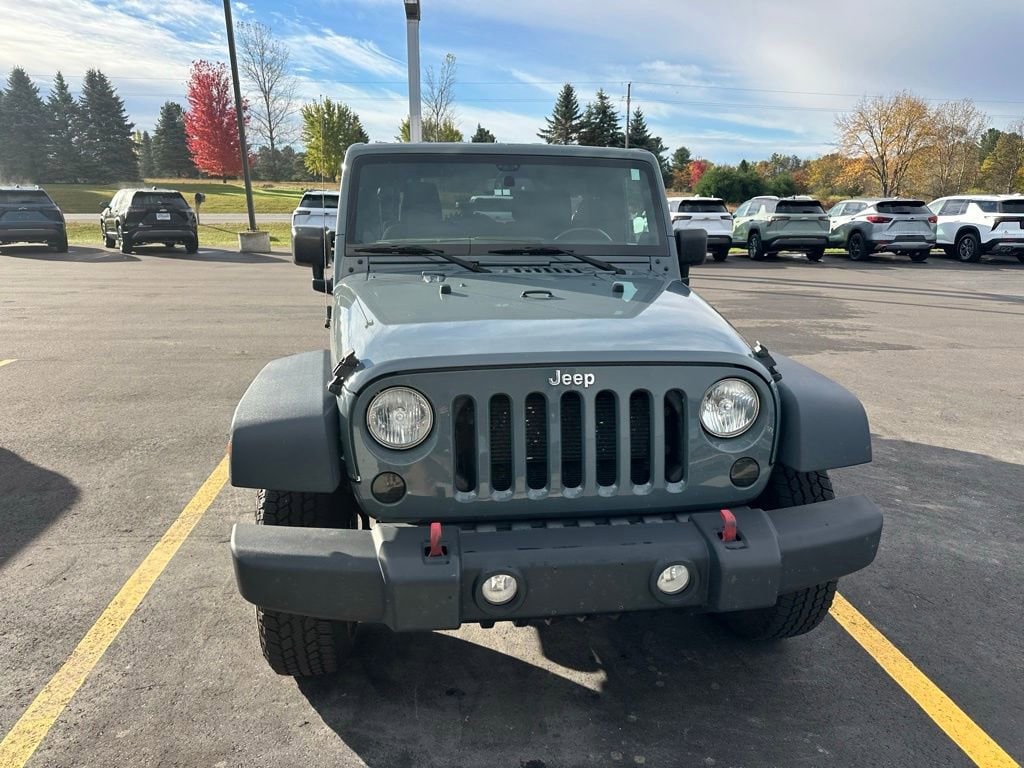 Used 2014 Jeep Wrangler Unlimited Sport with VIN 1C4BJWDG3EL269440 for sale in Lake City, MI