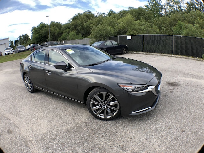 https://pictures.dealer.com/c/classicmazda/0665/8614d95a0008958479acb5de602ef57ax.jpg?impolicy=resize&w=650