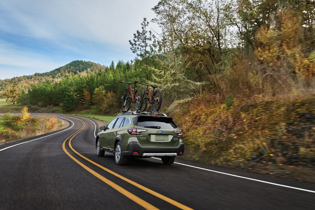 2025 Subaru Outback with roof rack for bicycles.
