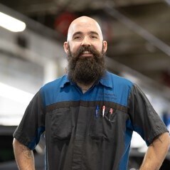 Staff member Carl Peterson from ID_242158e59201