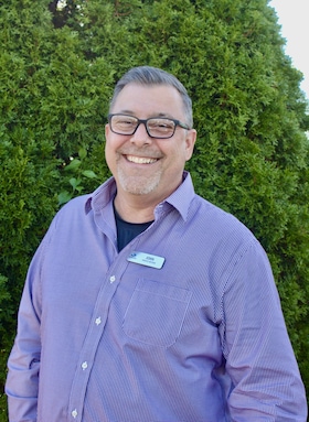 Staff member John from ID_81d9b85fe020