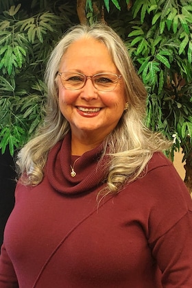 Staff member Cindy de la Garza from f7f44c0ab2b7