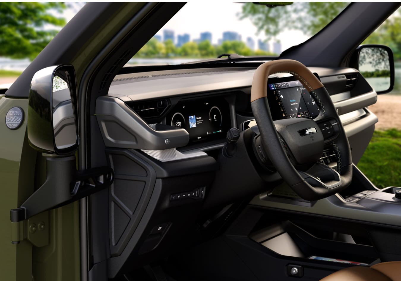 2026 Jeep Recon interior featuring a sleek dashboard with digital displays and a two-tone steering wheel.