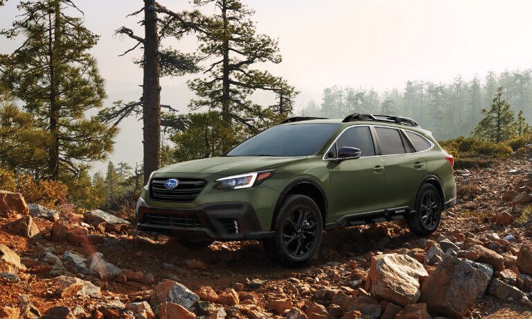 2022 Subaru Outback exterior offroading in forest