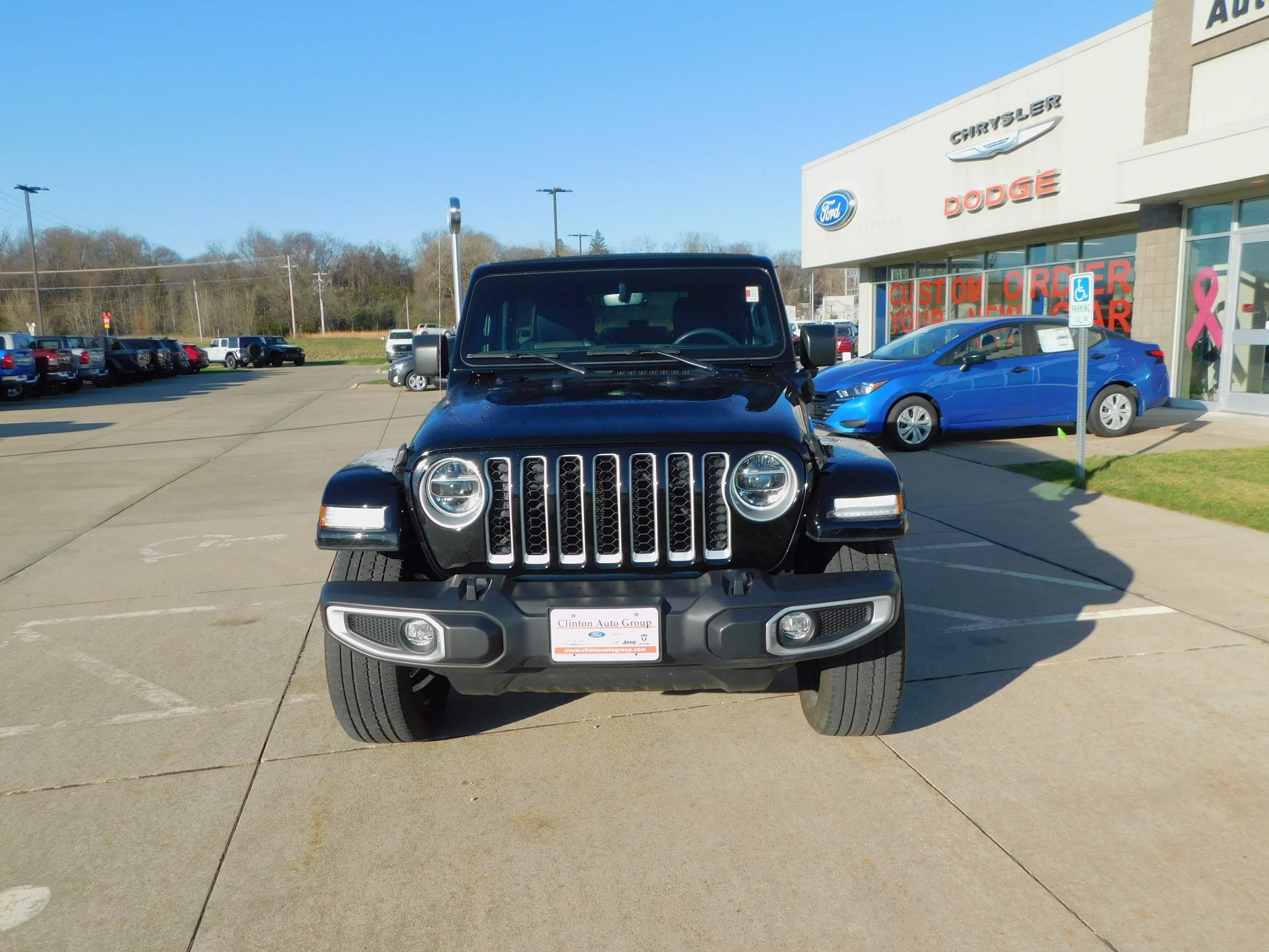 Used 2021 Jeep Wrangler Unlimited Sahara 4XE with VIN 1C4JJXP62MW699056 for sale in Clinton, IA