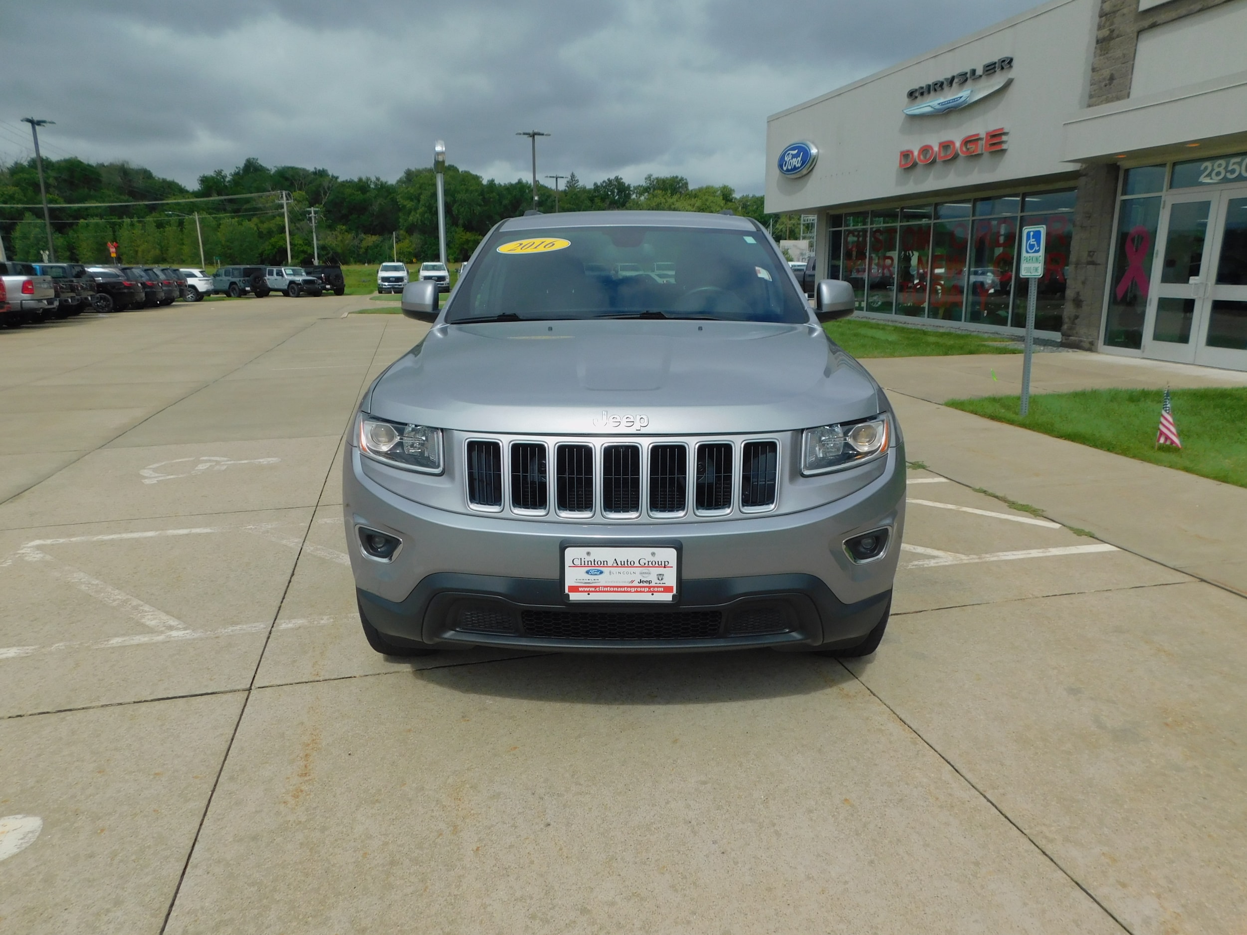 Used 2016 Jeep Grand Cherokee Laredo E with VIN 1C4RJFAG4GC312009 for sale in Clinton, IA