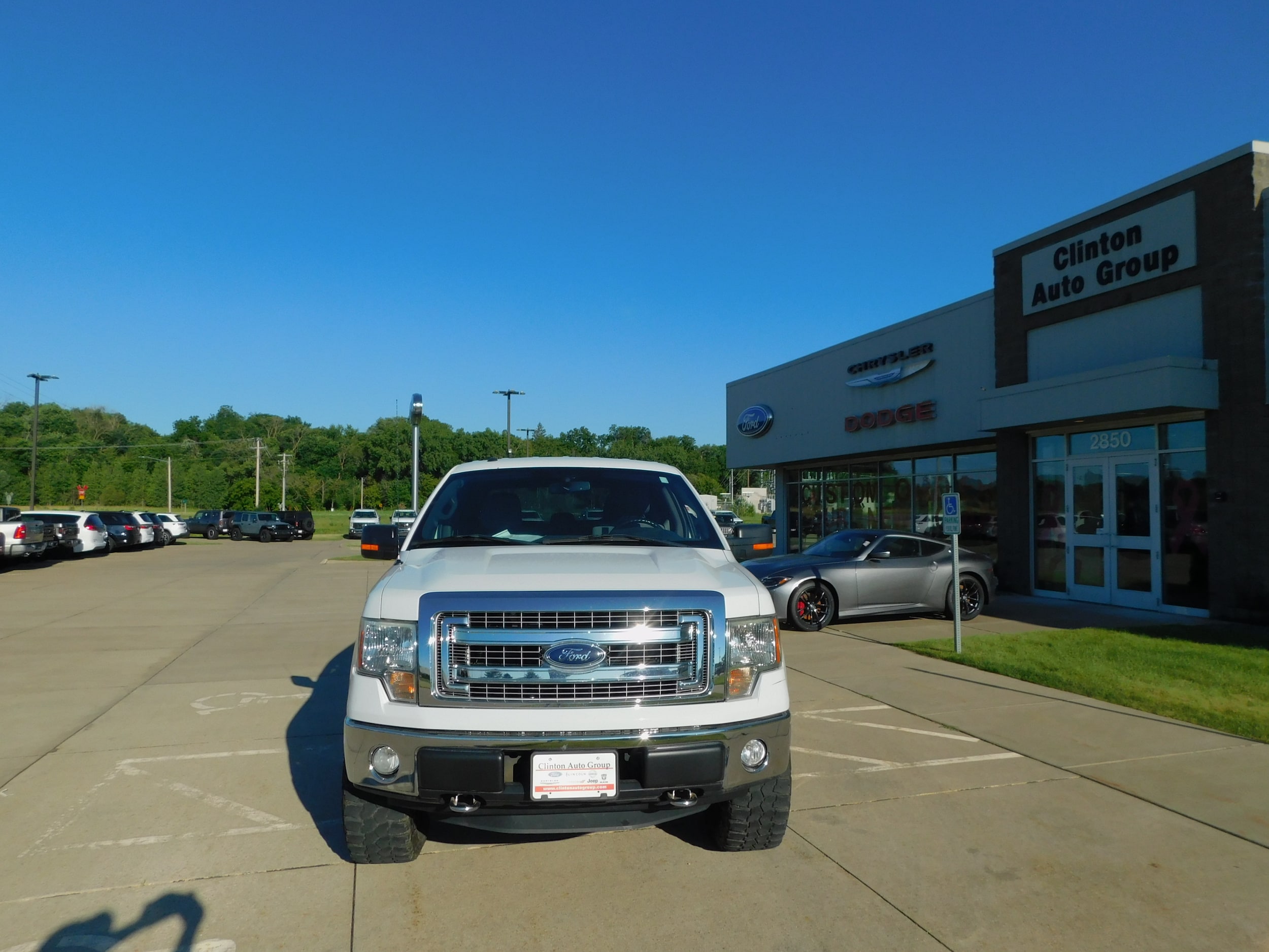 Used 2013 Ford F-150 XLT with VIN 1FTFW1EF6DFA35950 for sale in Clinton, IA