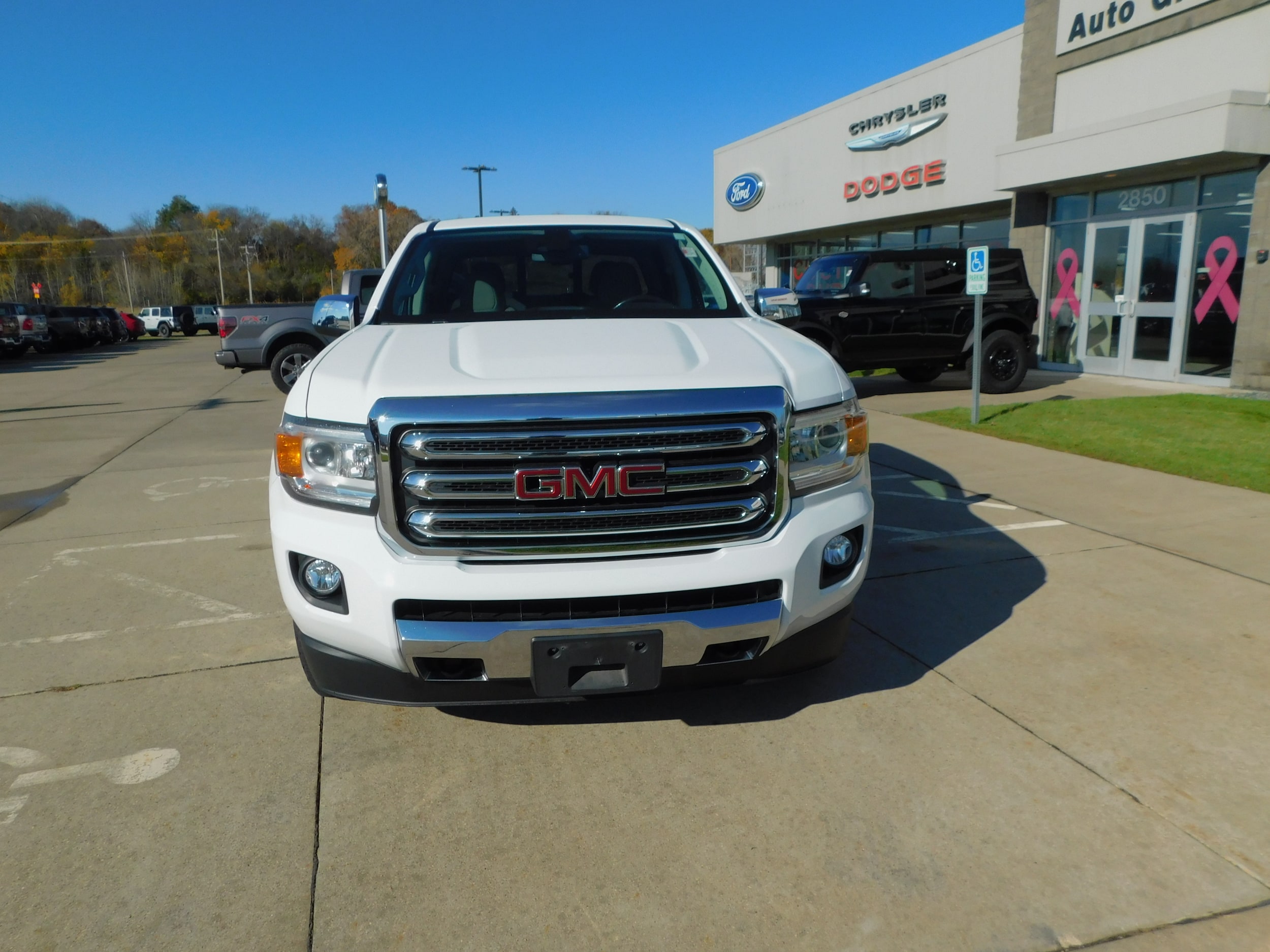 Used 2018 GMC Canyon SLT with VIN 1GTG6DEN6J1188673 for sale in Clinton, IA