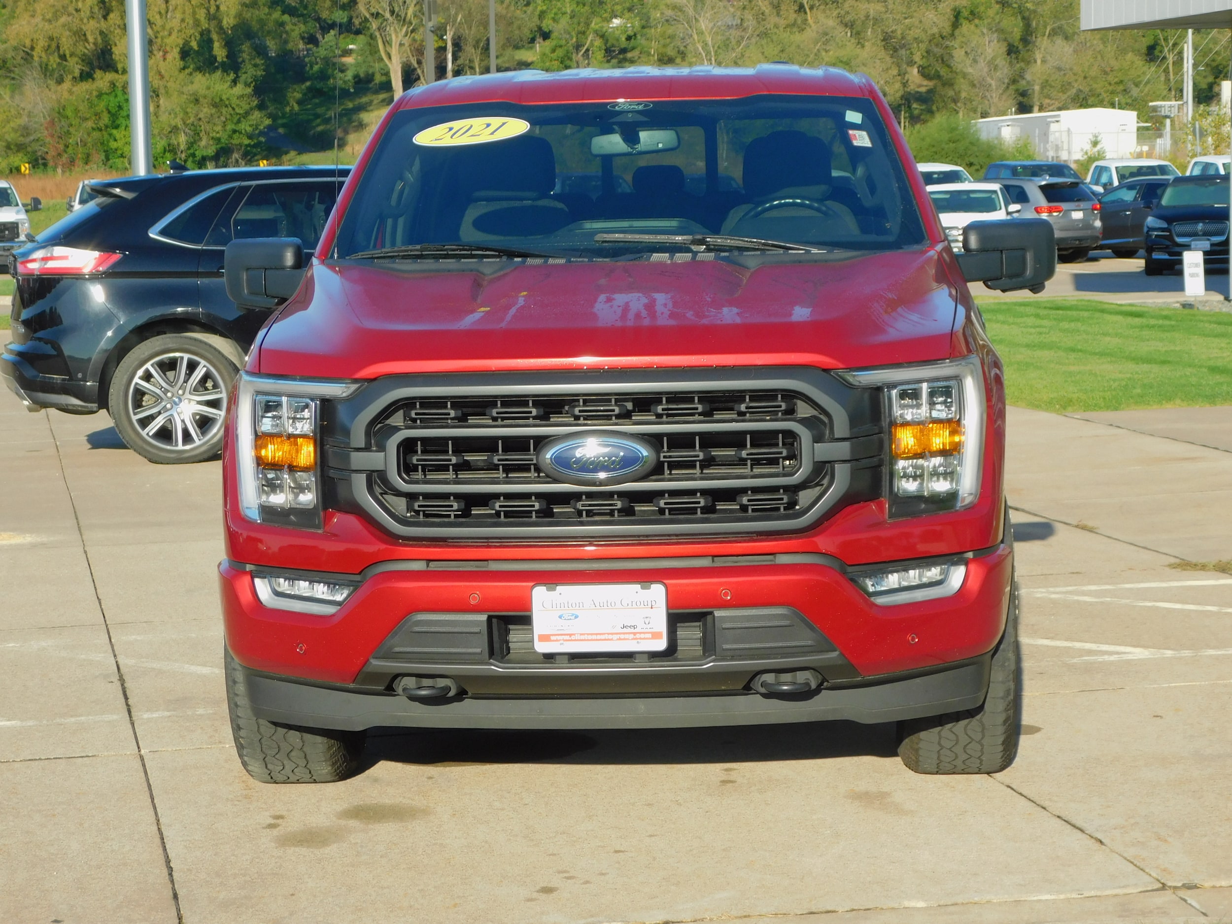 Used 2021 Ford F-150 XLT with VIN 1FTEW1EPXMKD84413 for sale in Clinton, IA