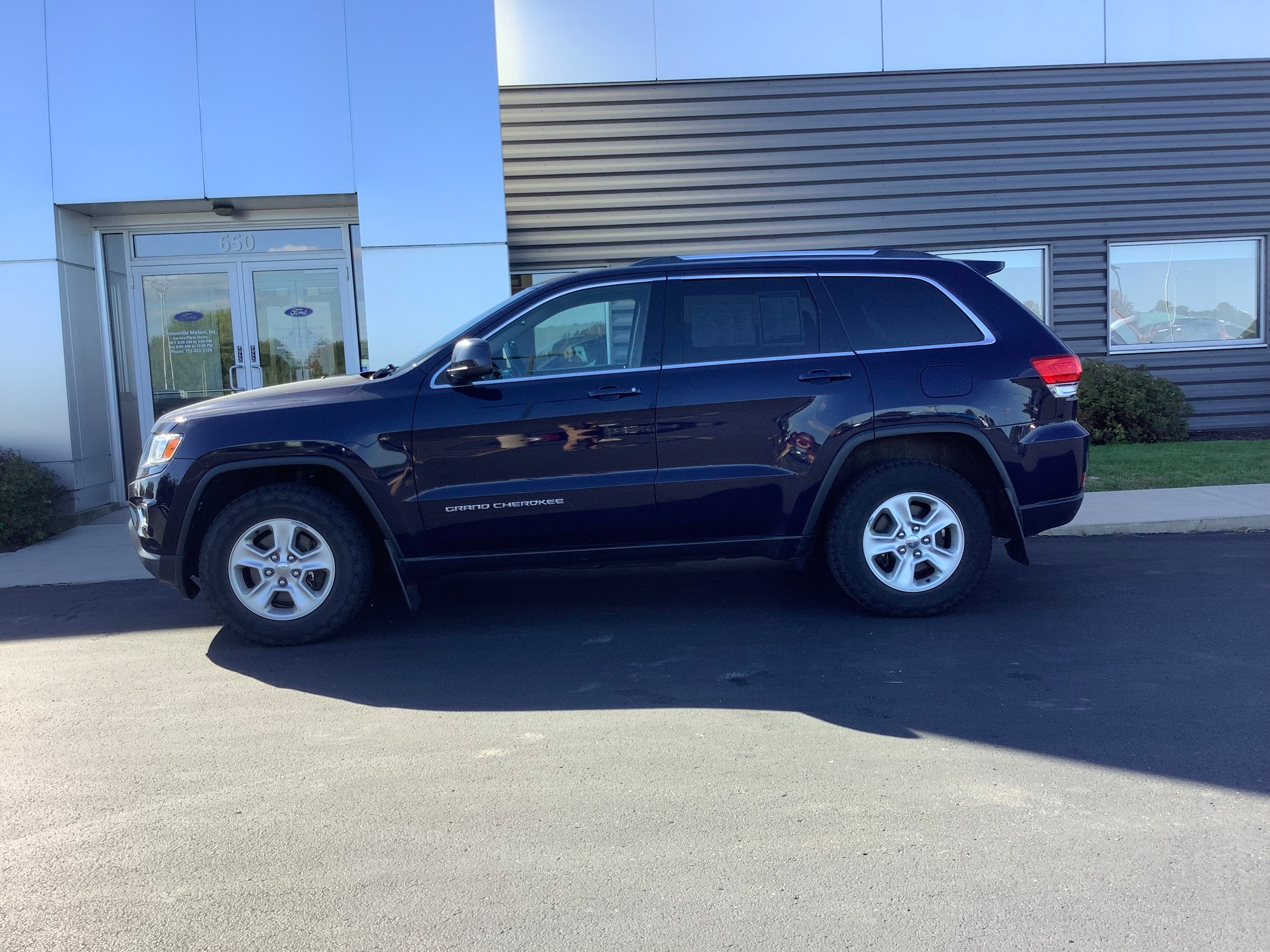 Used 2014 Jeep Grand Cherokee Laredo with VIN 1C4RJFAG2EC388566 for sale in Clintonville, WI
