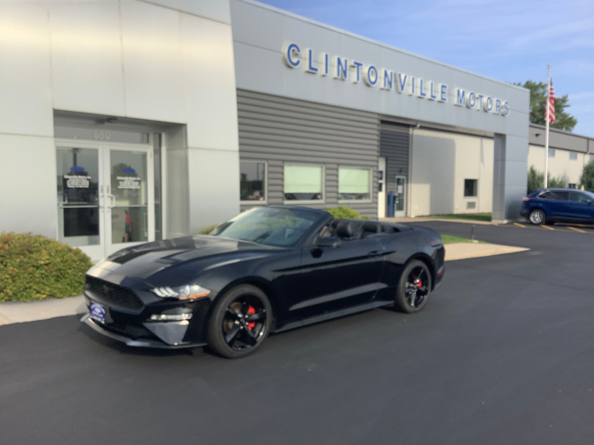 Used 2021 Ford Mustang EcoBoost Premium with VIN 1FATP8UHXM5130020 for sale in Clintonville, WI