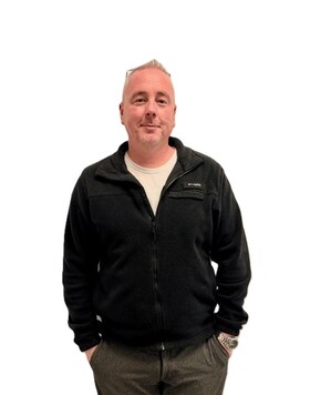 Staff member T.J. Combs from ID_9b9ae7d11671