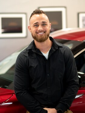 Staff member Kyle Grimes from ID_8a4be4cf3a80