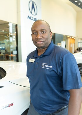 Staff member Carlos Narcisse from ID_d712e3b6122a
