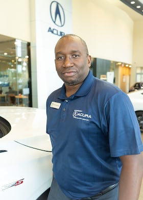 Staff member Carlos Narcisse from ID_d712e3b6122a