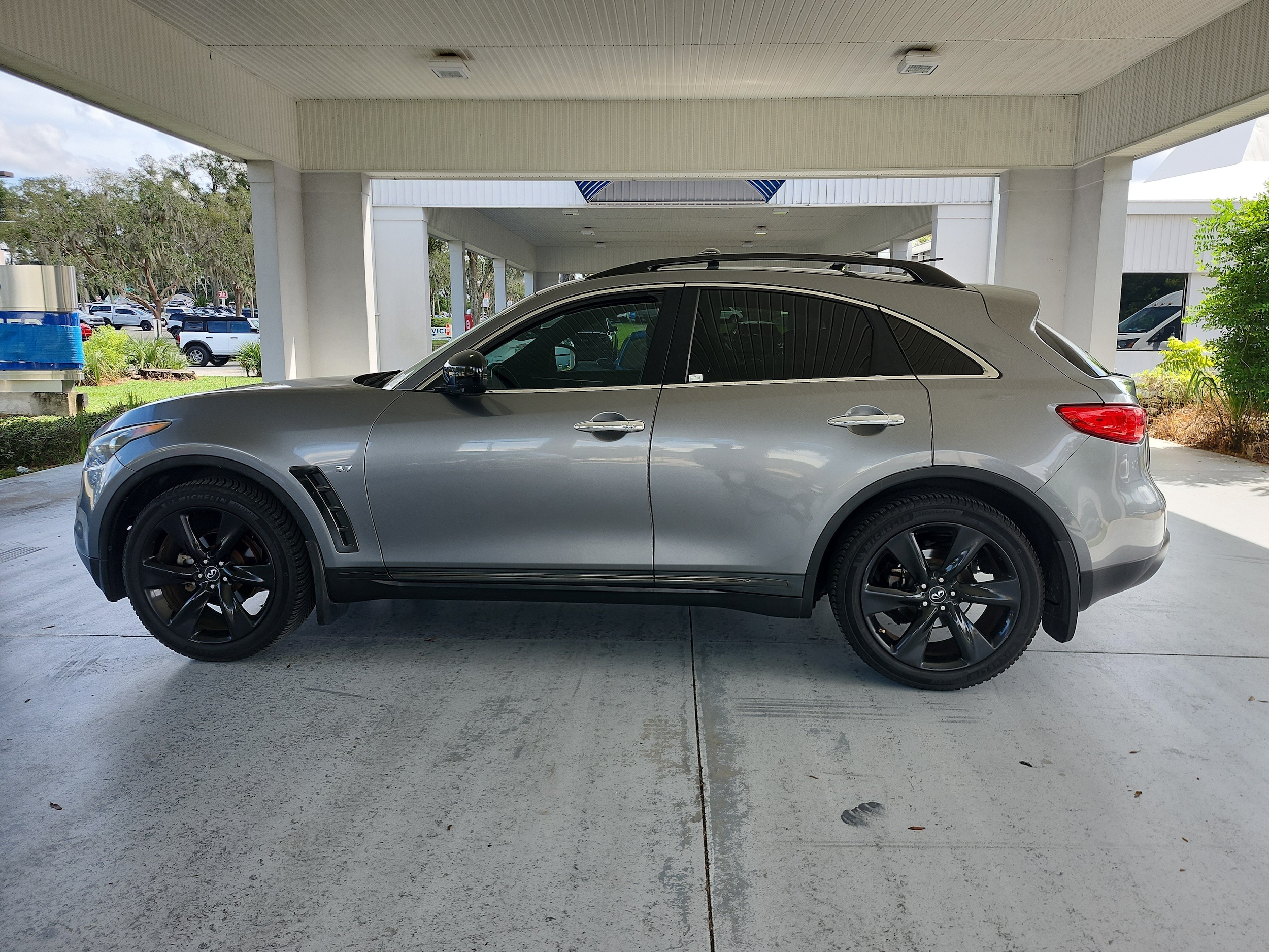 Used 2016 INFINITI QX70 Base with VIN JN8CS1MU9GM130036 for sale in Orange City, FL