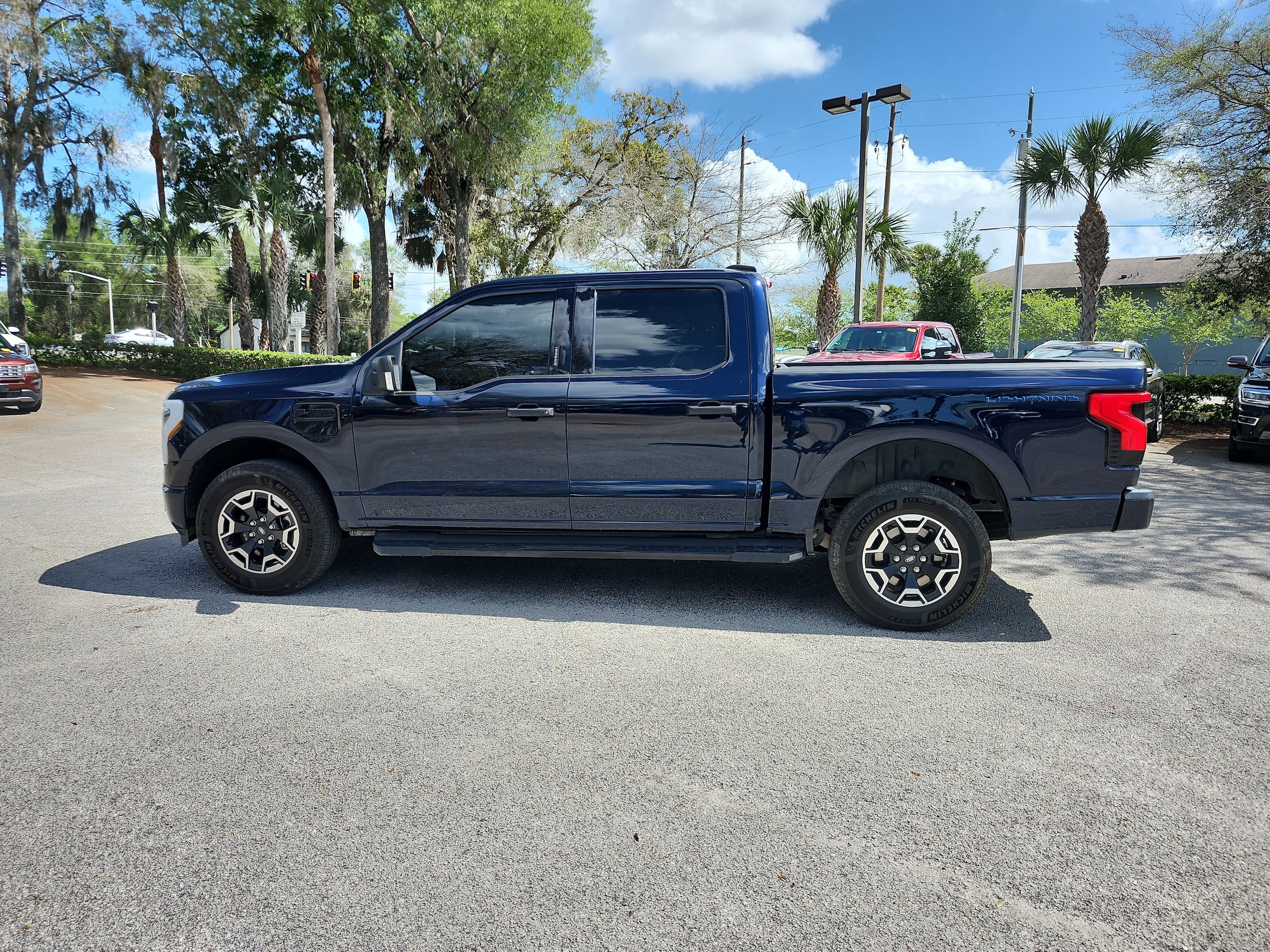 Certified 2022 Ford F-150 Lightning XLT with VIN 1FTVW1EL9NWG00372 for sale in Orange City, FL