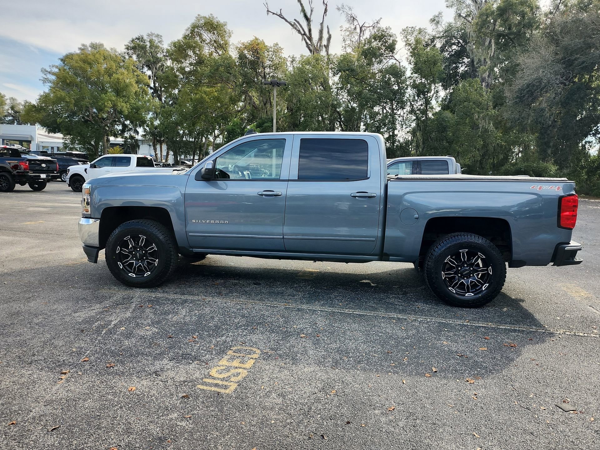 Used 2016 Chevrolet Silverado 1500 LT with VIN 3GCUKREC4GG231234 for sale in Orange City, FL
