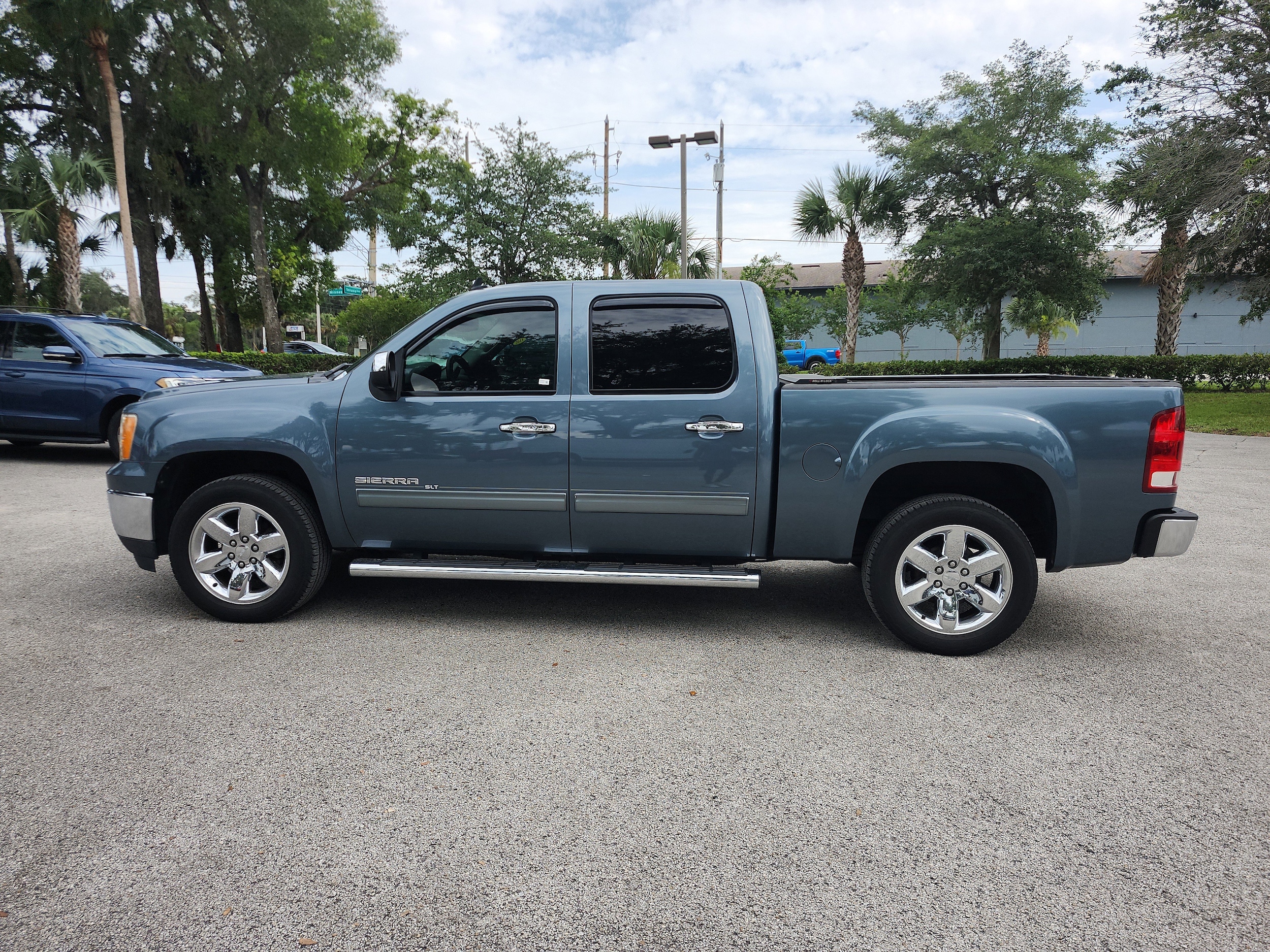 Used 2013 GMC Sierra 1500 SLT with VIN 3GTP1WE04DG296391 for sale in Orange City, FL