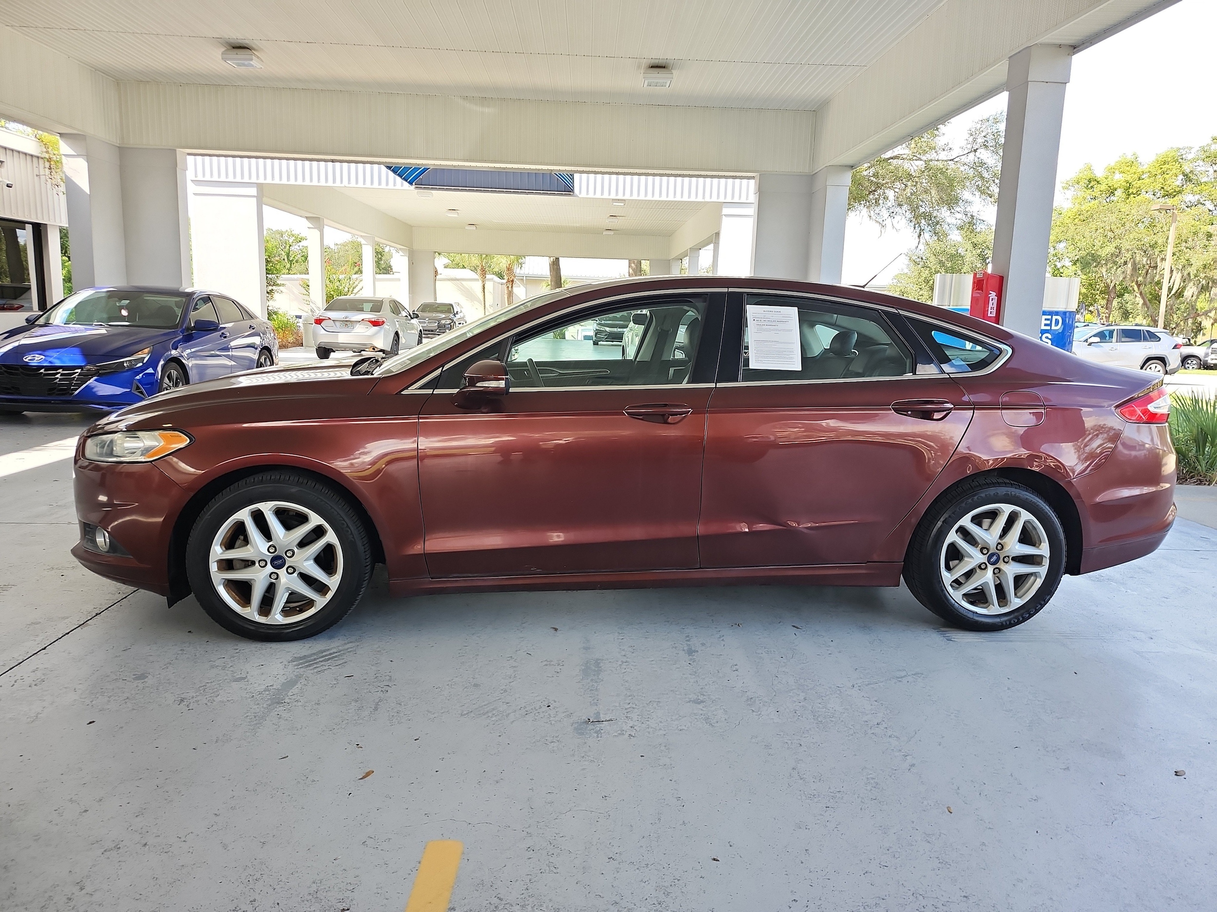 Used 2016 Ford Fusion SE with VIN 3FA6P0HD2GR336052 for sale in Orange City, FL