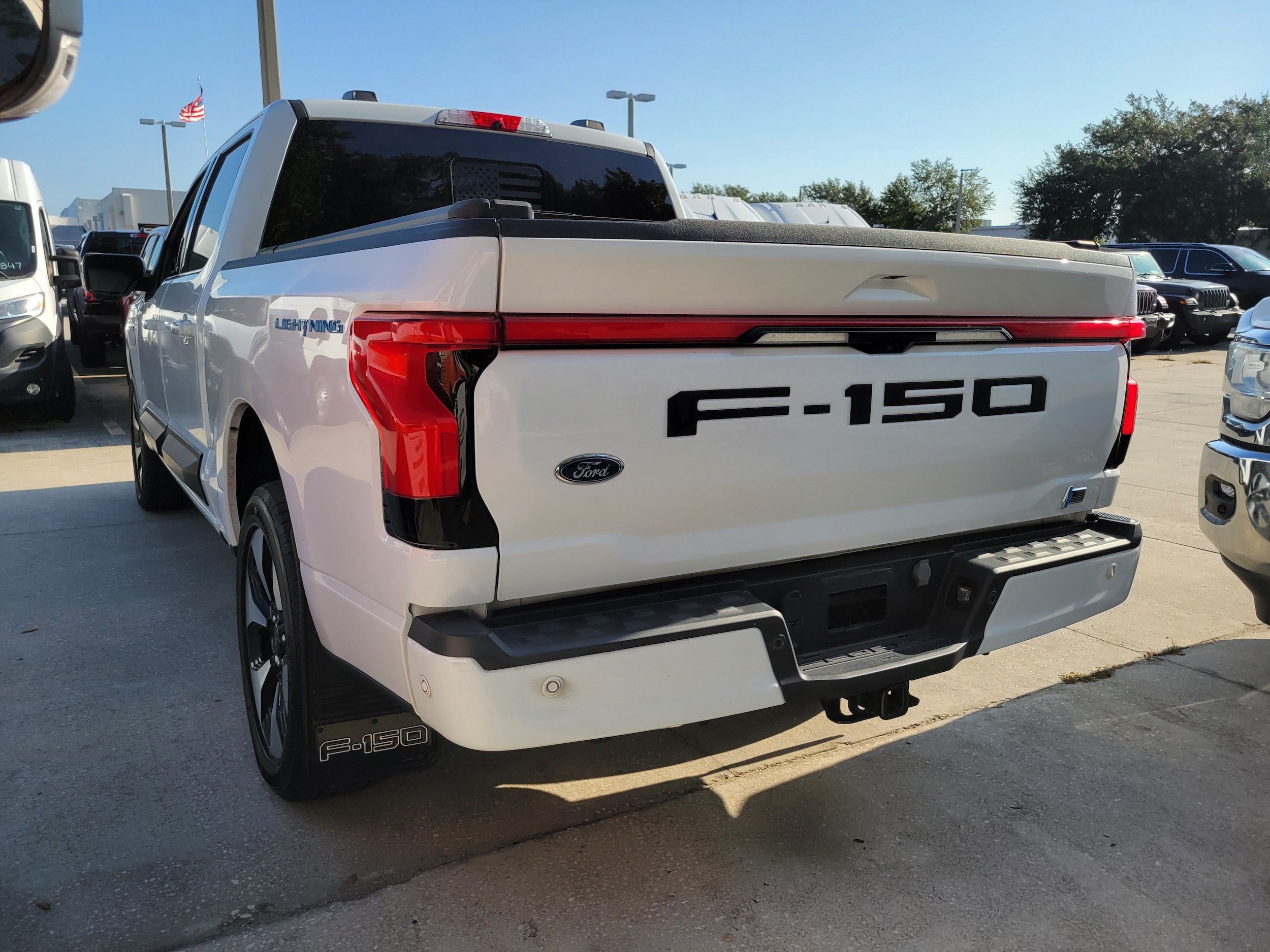 Used 2023 Ford F-150 Lightning Platinum with VIN 1FT6W1EV7PWG20399 for sale in Orange City, FL