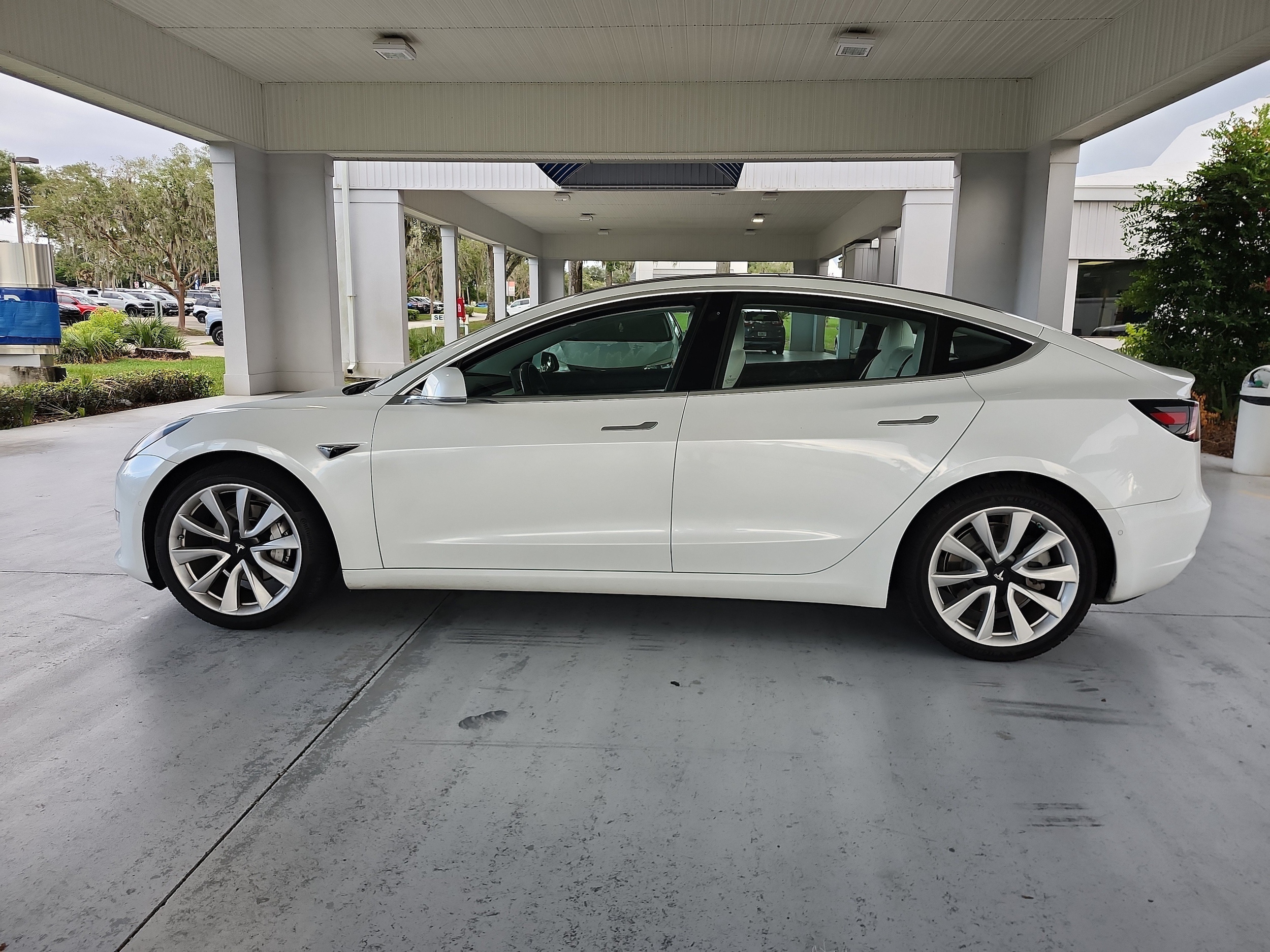 Used 2018 Tesla Model 3 Long Range with VIN 5YJ3E1EA5JF169603 for sale in Orange City, FL