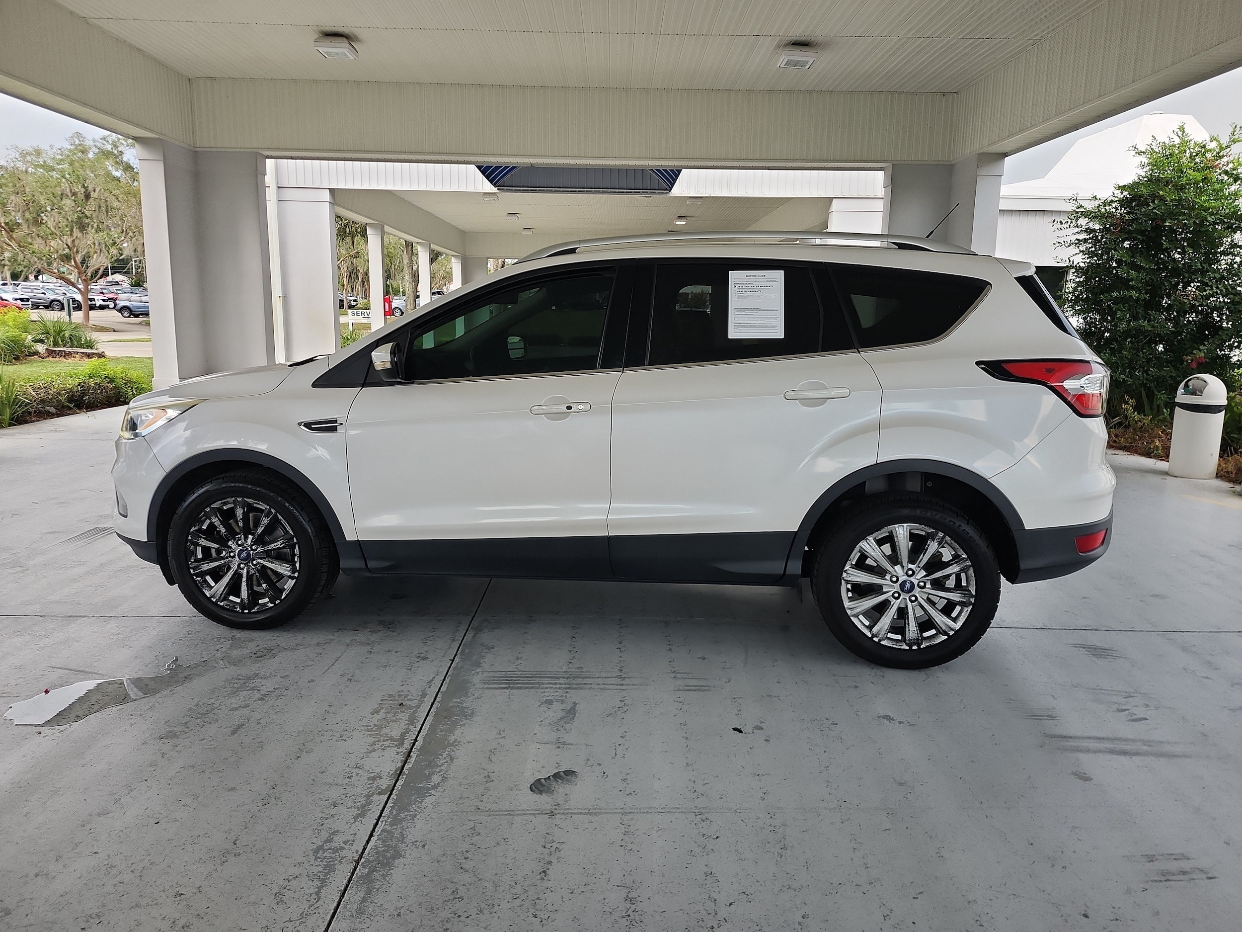 Used 2017 Ford Escape Titanium with VIN 1FMCU0J96HUE84898 for sale in Orange City, FL