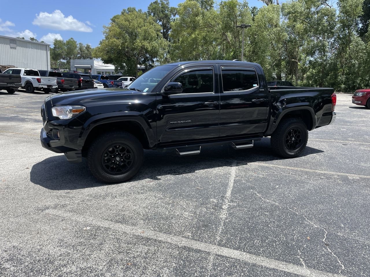 Used 2021 Toyota Tacoma SR5 with VIN 5TFAZ5CN2MX102007 for sale in Orange City, FL