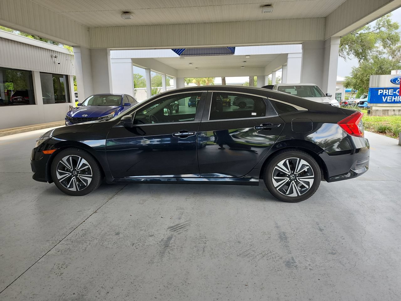 Used 2018 Honda Civic EX-T with VIN JHMFC1F33JX003457 for sale in Orange City, FL