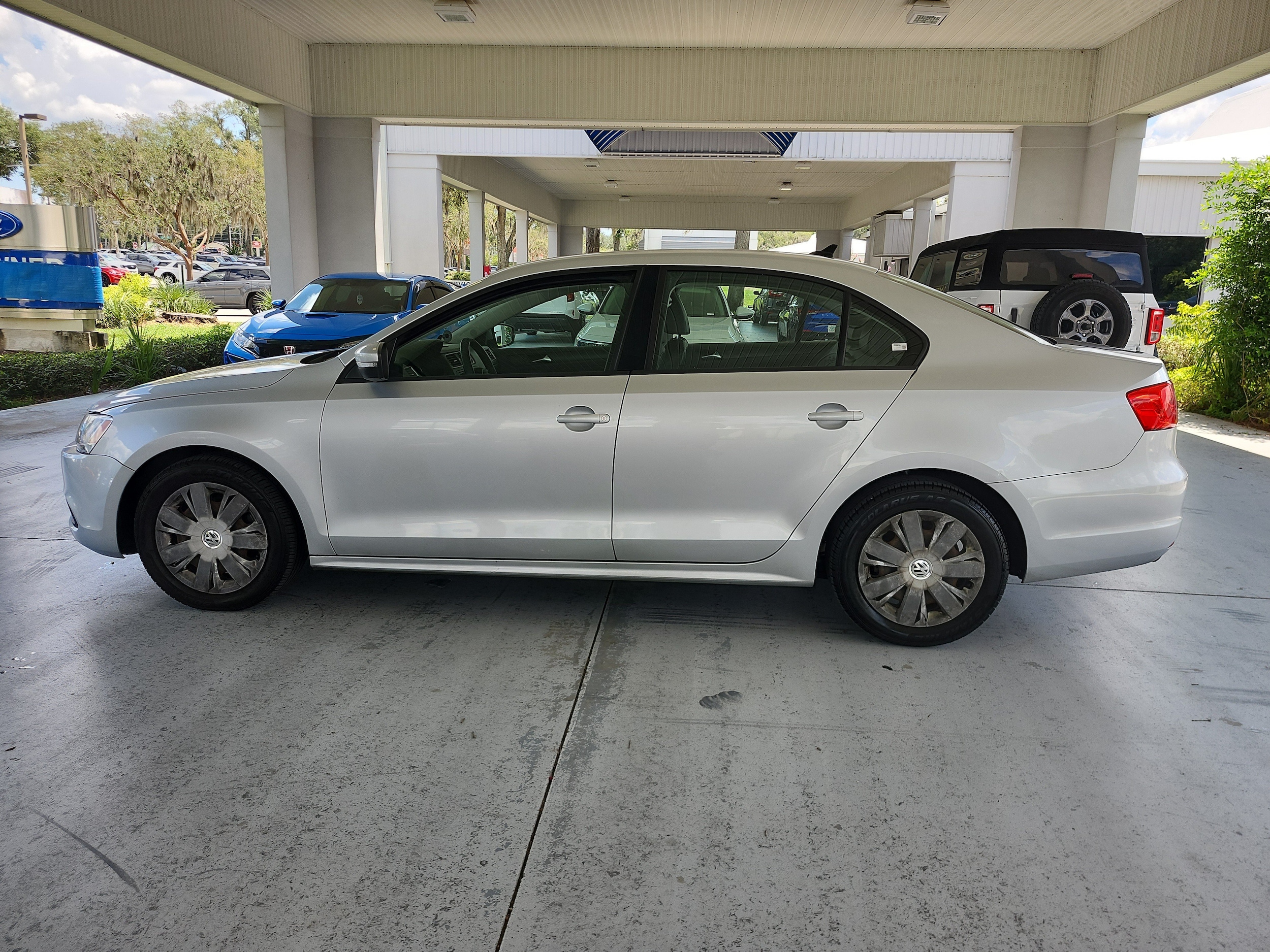 Used 2014 Volkswagen Jetta SE with VIN 3VWD17AJ2EM311851 for sale in Orange City, FL