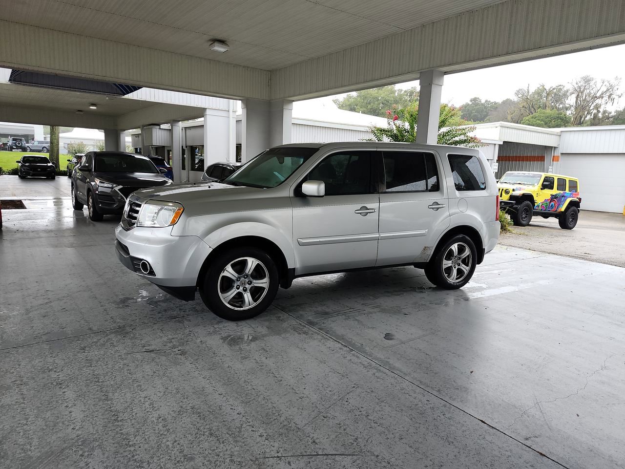 Certified 2015 Honda Pilot EX-L with VIN 5FNYF3H59FB002570 for sale in Orange City, FL